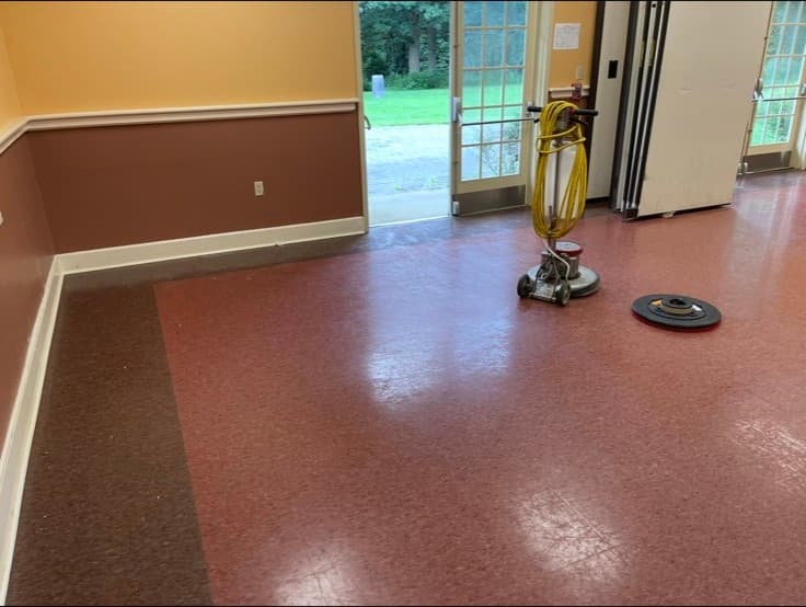 Second angle of the hall floor before, Flemington. Patriotic Office Cleaning.